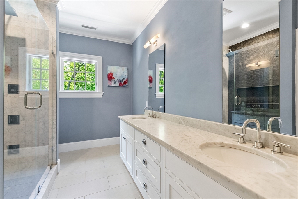 12 Cooke Road Lexington, MA 02420 - Photo 27 of 42 a bathroom with a granite countertop sink and a mirror