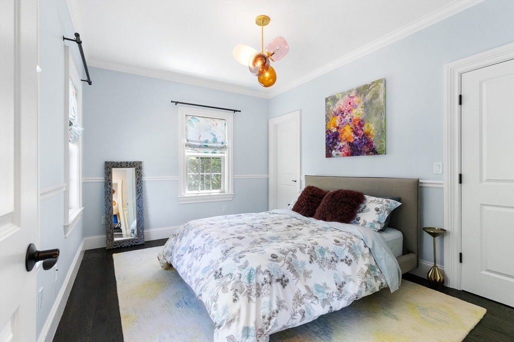 12 Cooke Road Lexington, MA 02420 - Photo 29 of 42 a bedroom with a bed and a window