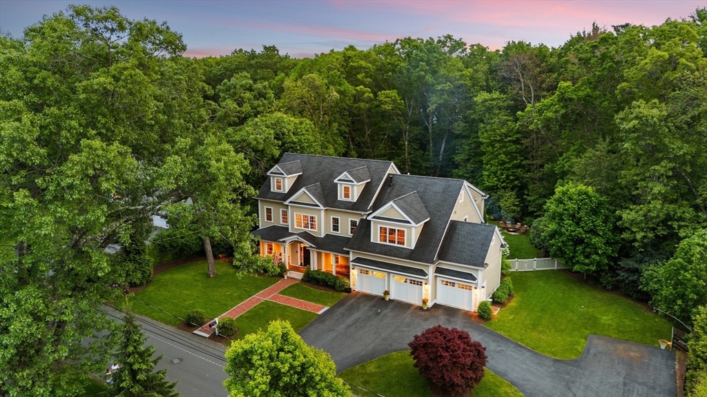 12 Cooke Road Lexington, MA 02420 - Photo 3 of 42 an aerial view of a house with a garden