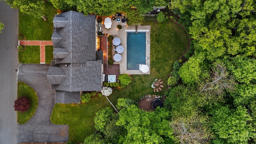 12 Cooke Road Lexington, MA 02420 - Photo 36 of 42 an aerial view of a house with a yard and large trees