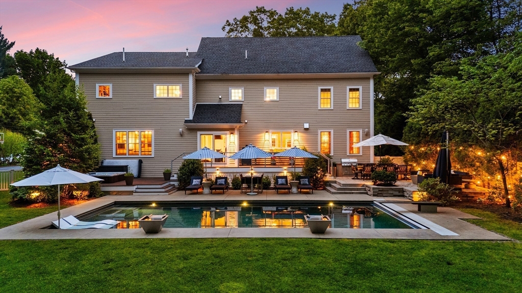 12 Cooke Road Lexington, MA 02420 - Photo 40 of 42 a view of a house with swimming pool and a yard