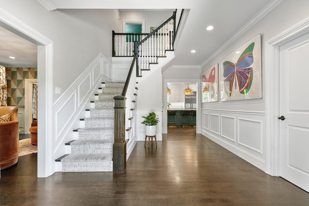 12 Cooke Road Lexington, MA 02420 - Photo 7 of 42 a view of entryway with livingroom and wooden floor