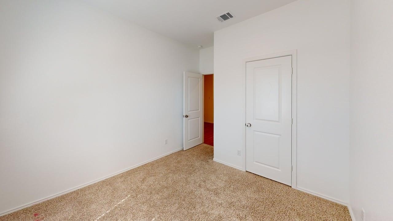 1112 Rio Frio Lane Georgetown, TX 78626 - Photo 16 of 21 Unfurnished bedroom with carpet and baseboards