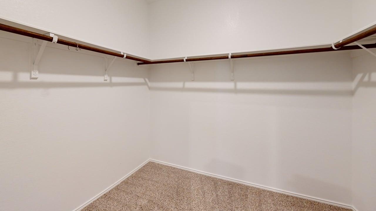 1112 Rio Frio Lane Georgetown, TX 78626 - Photo 19 of 21 Walk in closet with carpet floors