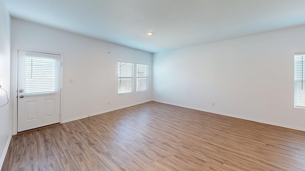 1112 Rio Frio Lane Georgetown, TX 78626 - Photo 6 of 21 Unfurnished room with wood finished floors and recessed lighting