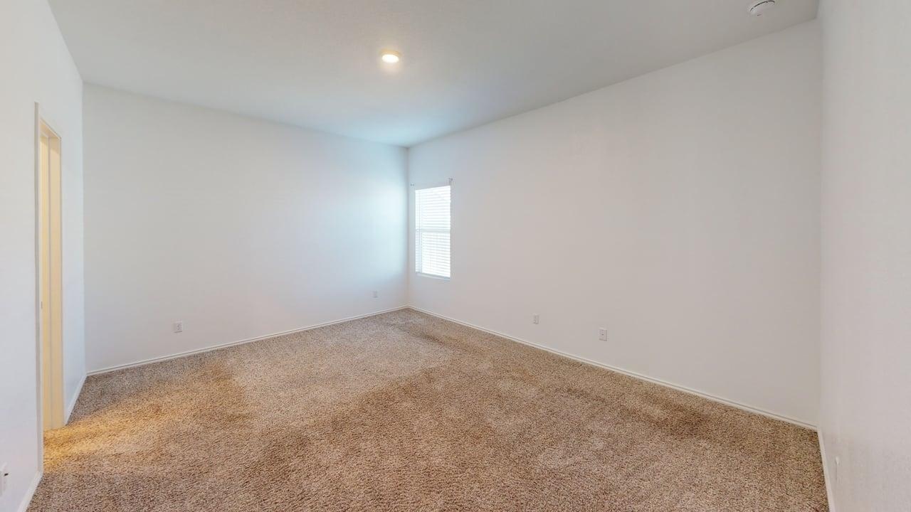 1112 Rio Frio Lane Georgetown, TX 78626 - Photo 9 of 21 Carpeted spare room with baseboards