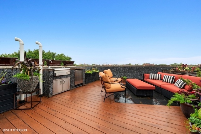 2029 West Rice Street, Unit 3 Chicago, IL 60622 - Photo 11 of 11 a view of a roof deck with couches