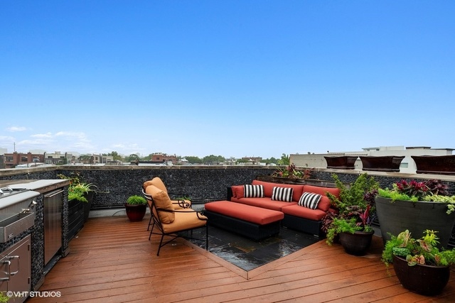 2029 West Rice Street, Unit 3 Chicago, IL 60622 - Photo 10 of 11 a view of a terrace with couches and lounge chairs