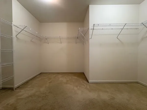 a view of a room with racks on the wall
