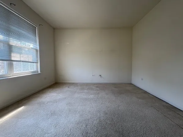 a view of a room with an empty space