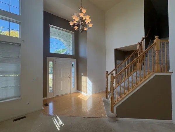 a view of entryway with a front door