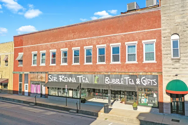 a building on the corner of street