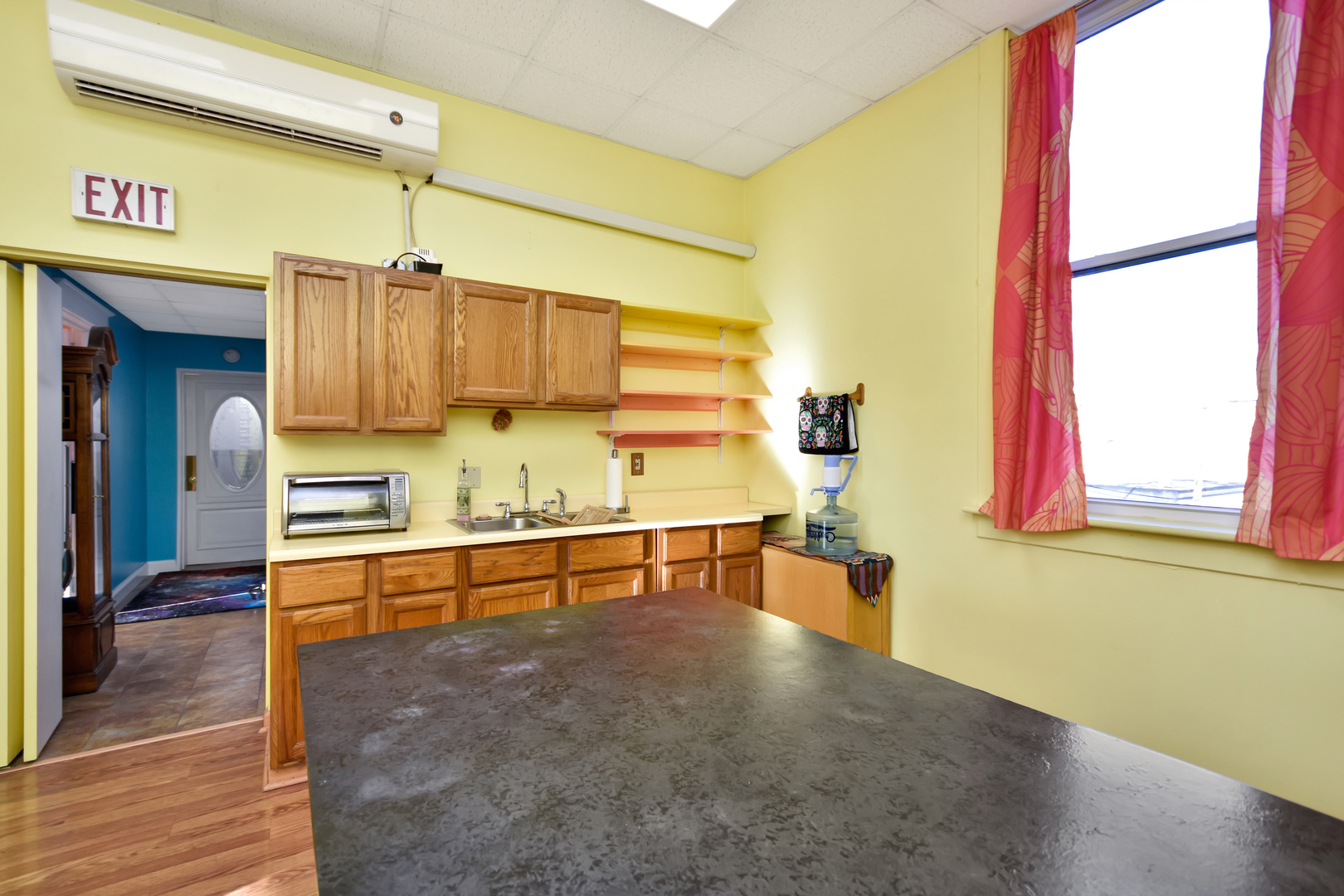 113 North Kickapoo Street Lincoln, IL 62656 - Photo 11 of 48 a view of kitchen and dining room with furniture