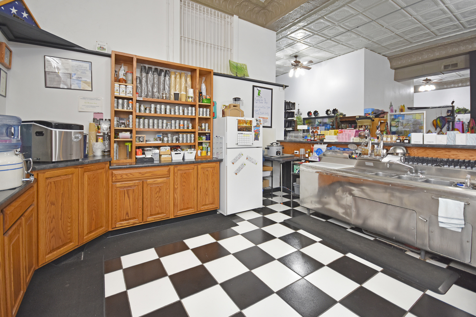 113 North Kickapoo Street Lincoln, IL 62656 - Photo 20 of 48 a room with stainless steel appliances and cabinets