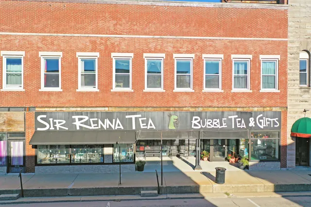 a view of a building with a sign board