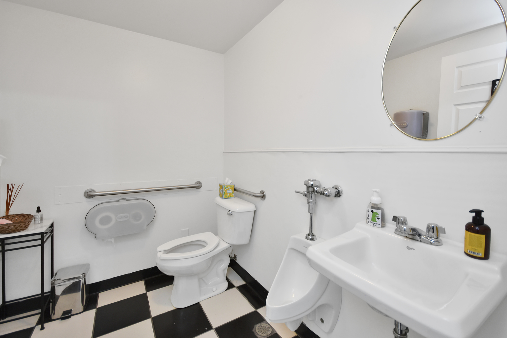 113 North Kickapoo Street Lincoln, IL 62656 - Photo 30 of 48 a bathroom with a sink and a mirror