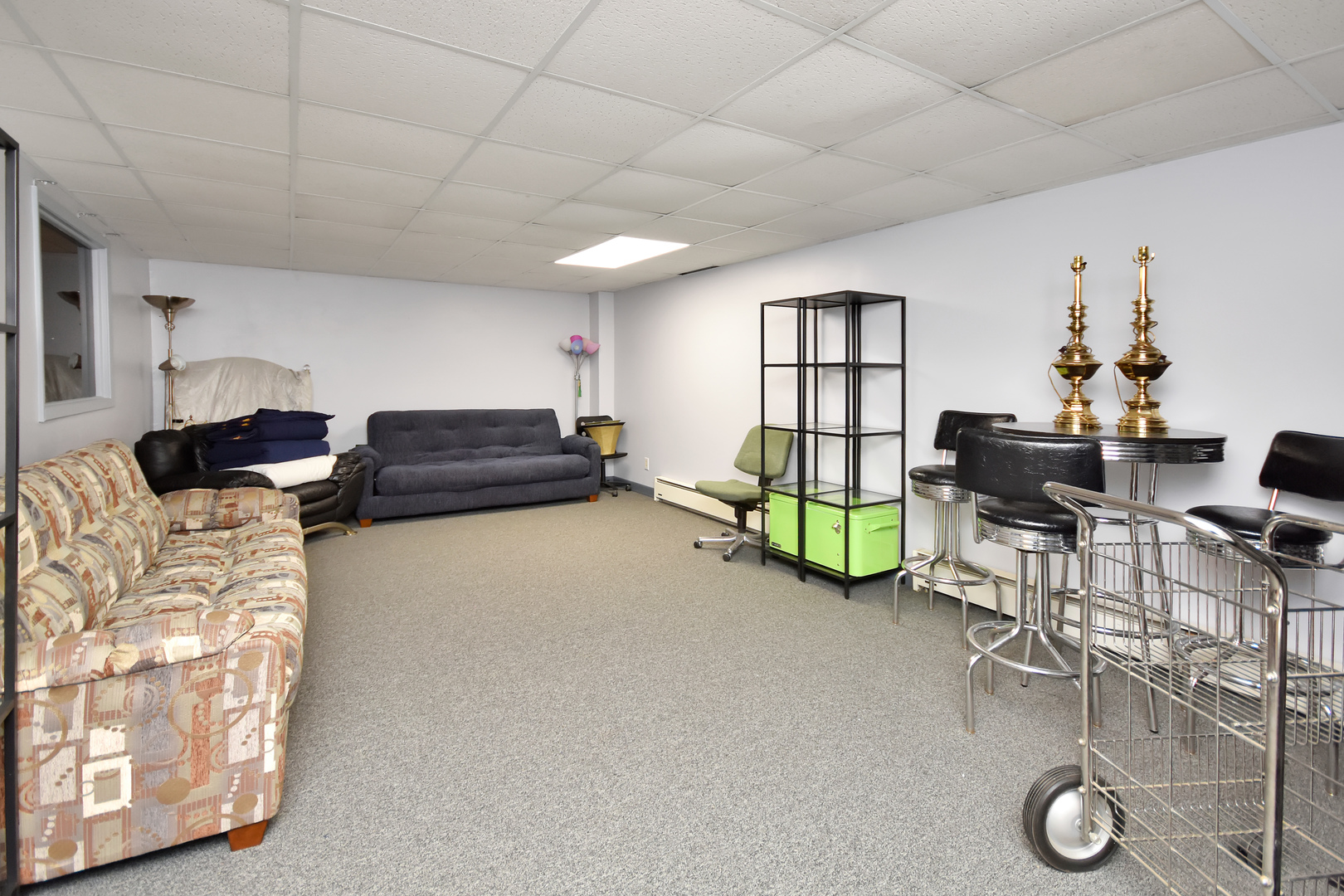 113 North Kickapoo Street Lincoln, IL 62656 - Photo 32 of 48 a bedroom with furniture and a window