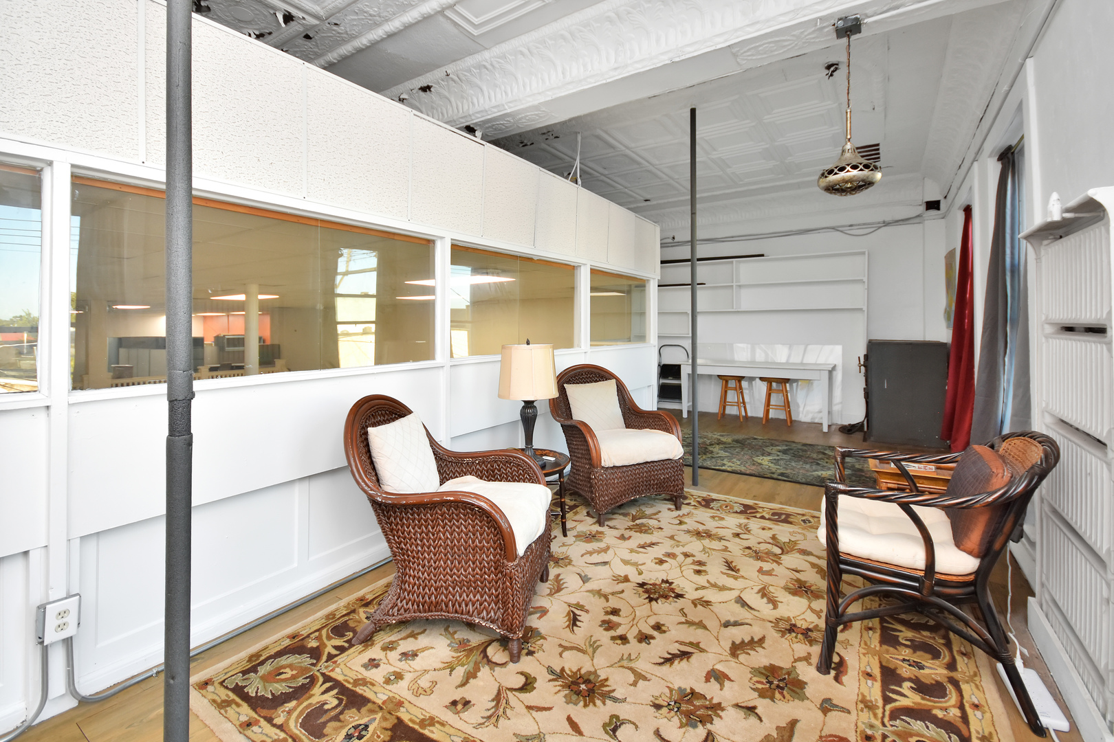 113 North Kickapoo Street Lincoln, IL 62656 - Photo 39 of 48 a living room with furniture and a floor to ceiling window