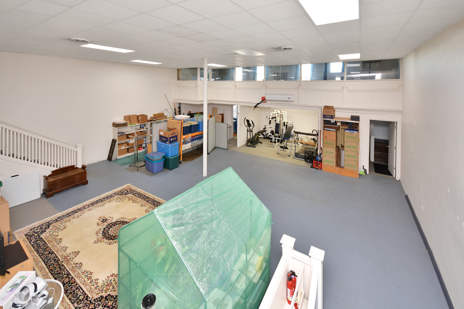 113 North Kickapoo Street Lincoln, IL 62656 - Photo 42 of 48 a very nice looking room with lots of gym equipment