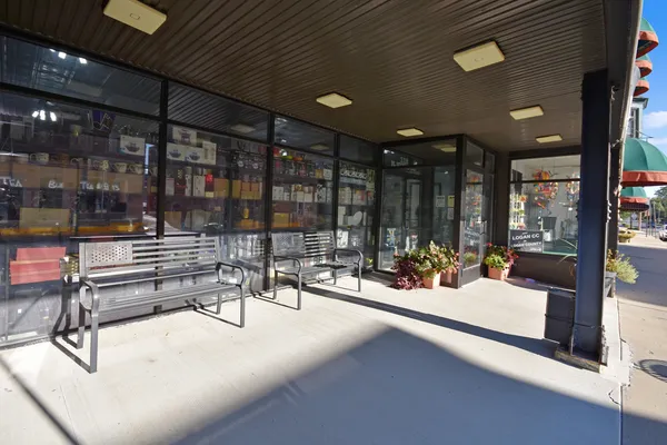 a outdoor space with lots of tables and chairs