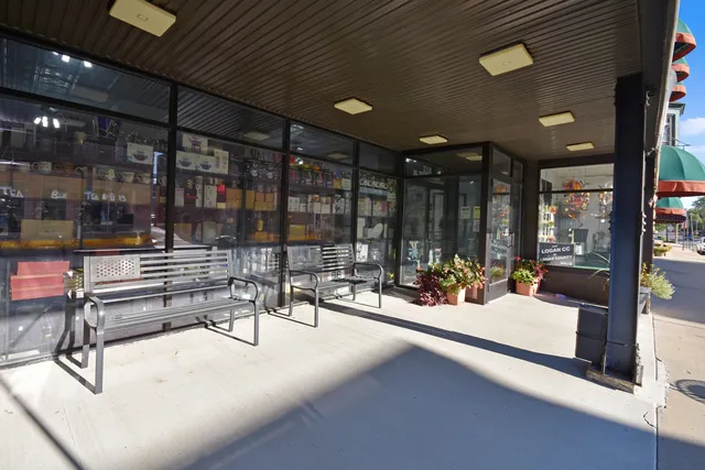 a outdoor space with lots of tables and chairs