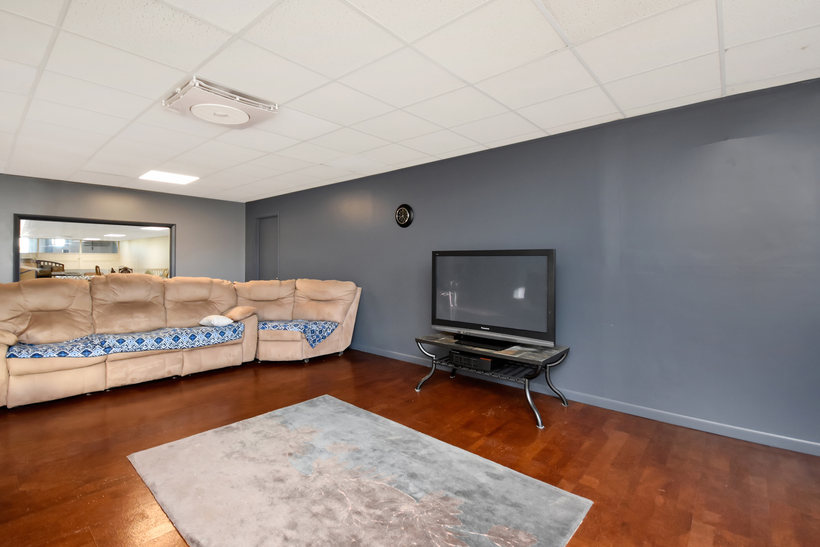 113 North Kickapoo Street Lincoln, IL 62656 - Photo 7 of 48 a bedroom with a bed and wooden floor