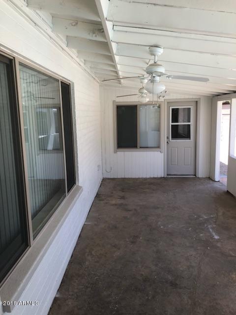 4008 West Davidson Lane Phoenix, AZ 85051 - Photo 9 of 12 a view of livingroom with window