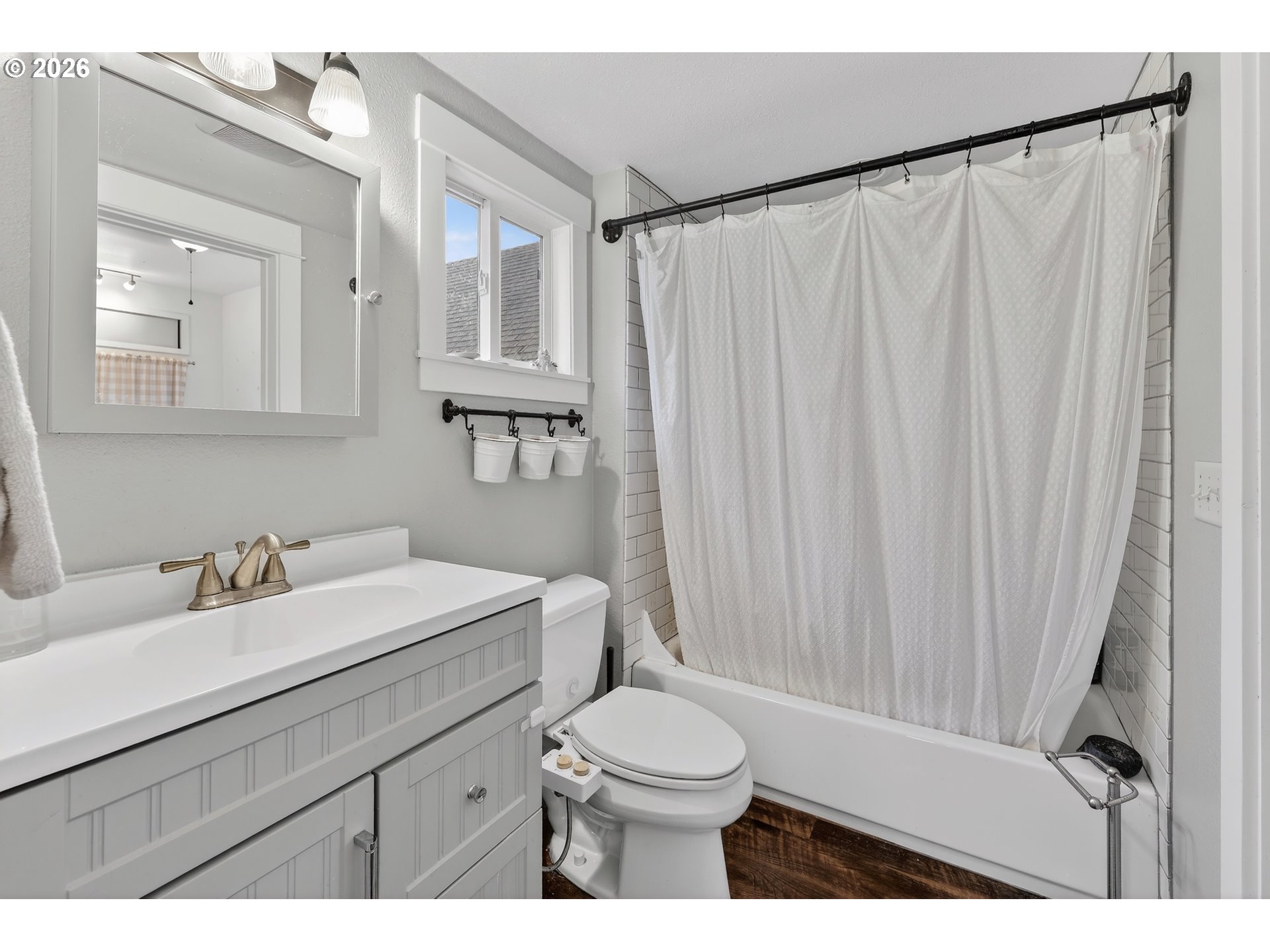 352 21st Street Northeast Salem, OR 97301 - Photo 19 of 41 a bathroom with a sink a toilet and shower