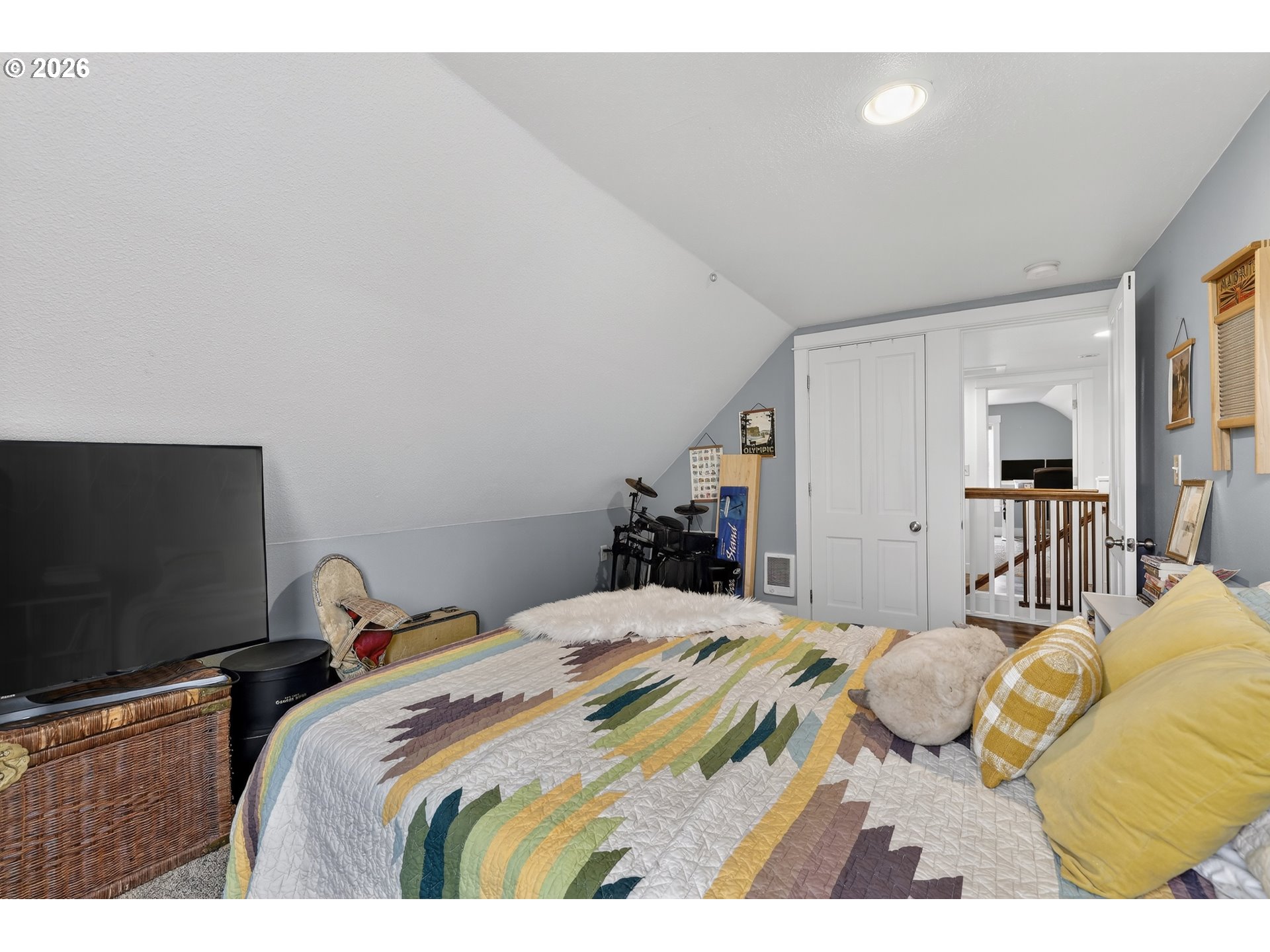 352 21st Street Northeast Salem, OR 97301 - Photo 21 of 41 a bedroom with a bed and a flat screen tv