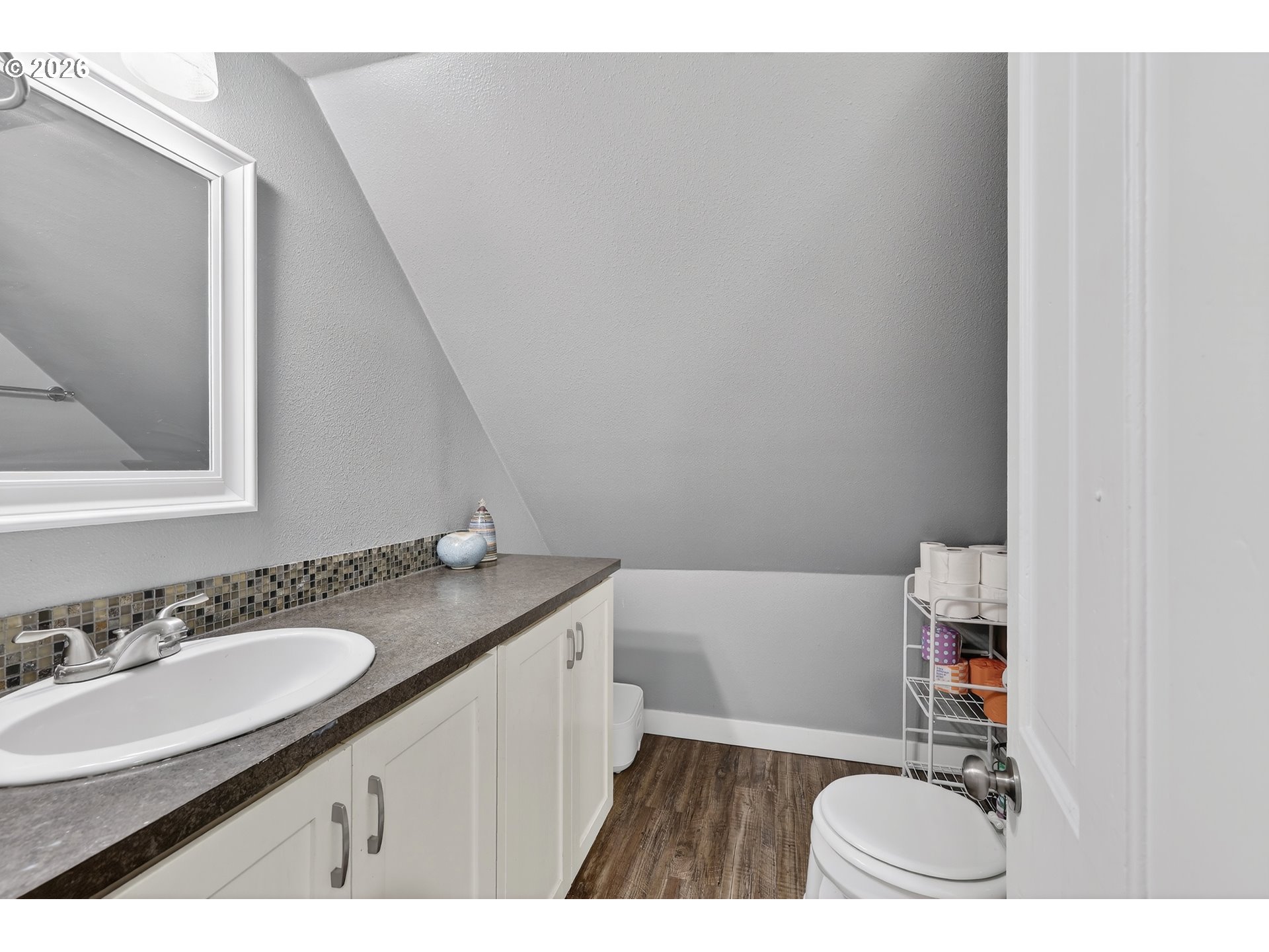 352 21st Street Northeast Salem, OR 97301 - Photo 26 of 41 a bathroom with a sink and a mirror