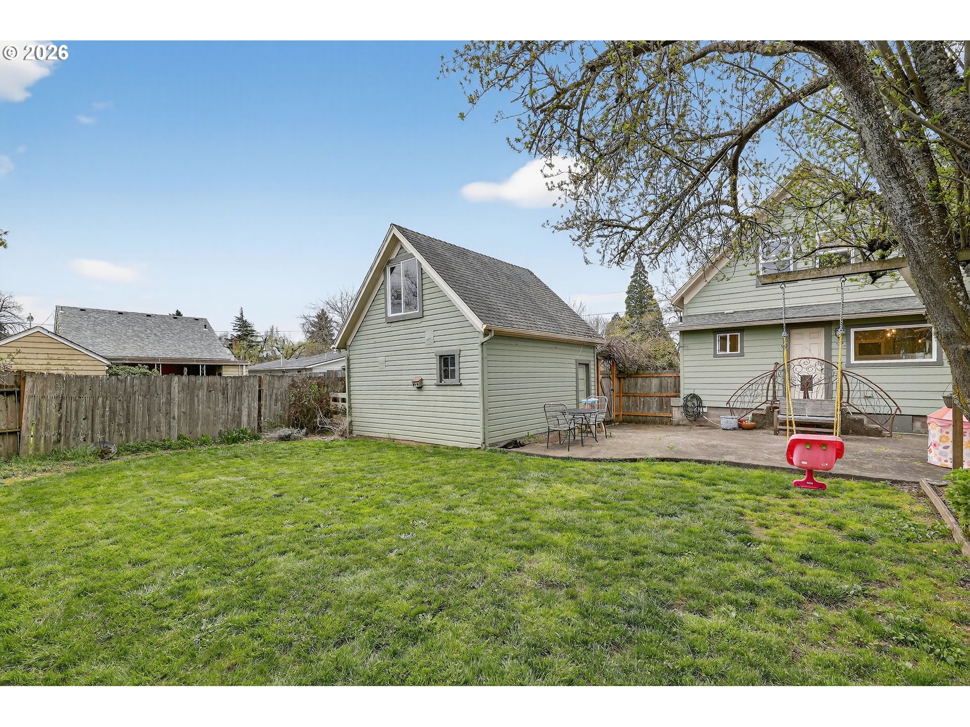 352 21st Street Northeast Salem, OR 97301 - Photo 29 of 41 a view of a house with a yard and sitting area