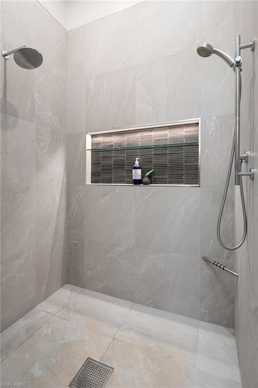 1070 5th Street South Naples, FL 34102 - Photo 12 of 23 a bathroom with a shower