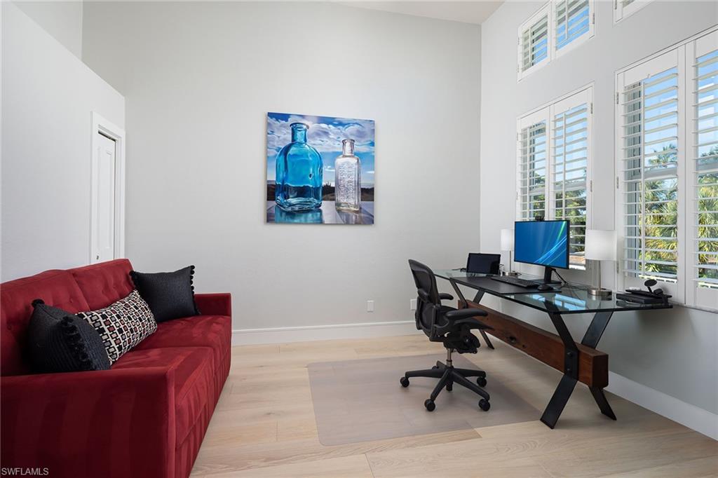 1070 5th Street South Naples, FL 34102 - Photo 13 of 23 a workspace with furniture and a window