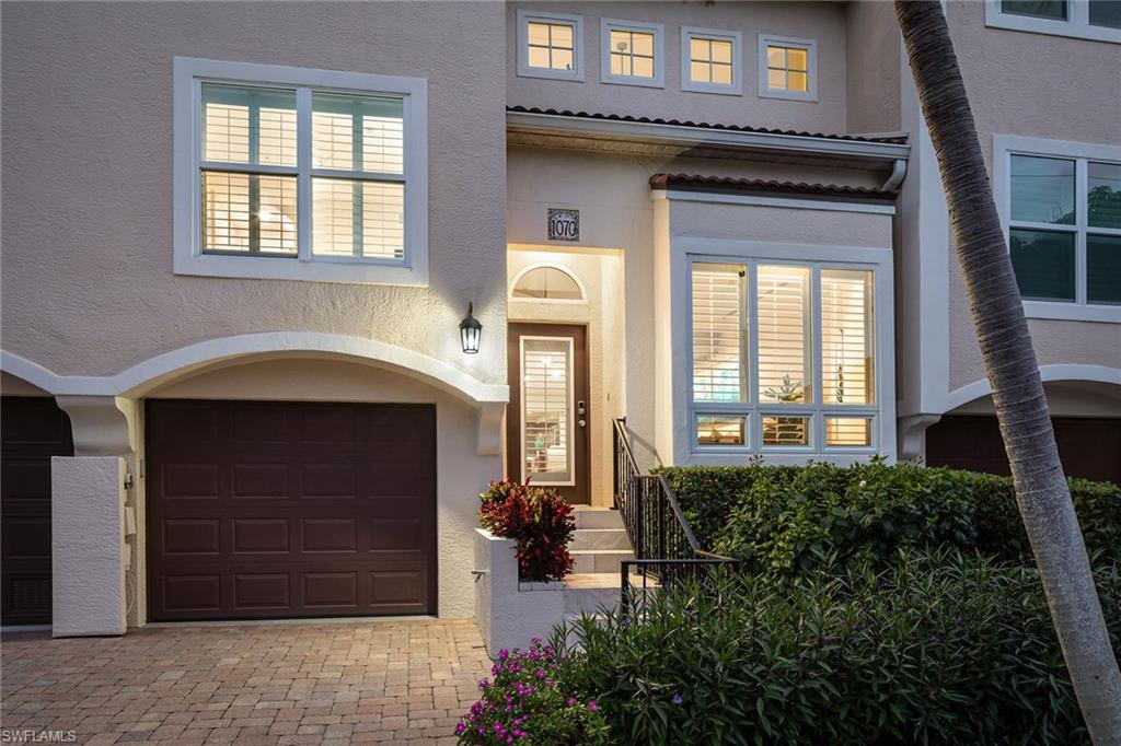 1070 5th Street South Naples, FL 34102 - Photo 23 of 23 a front view of a house with a yard