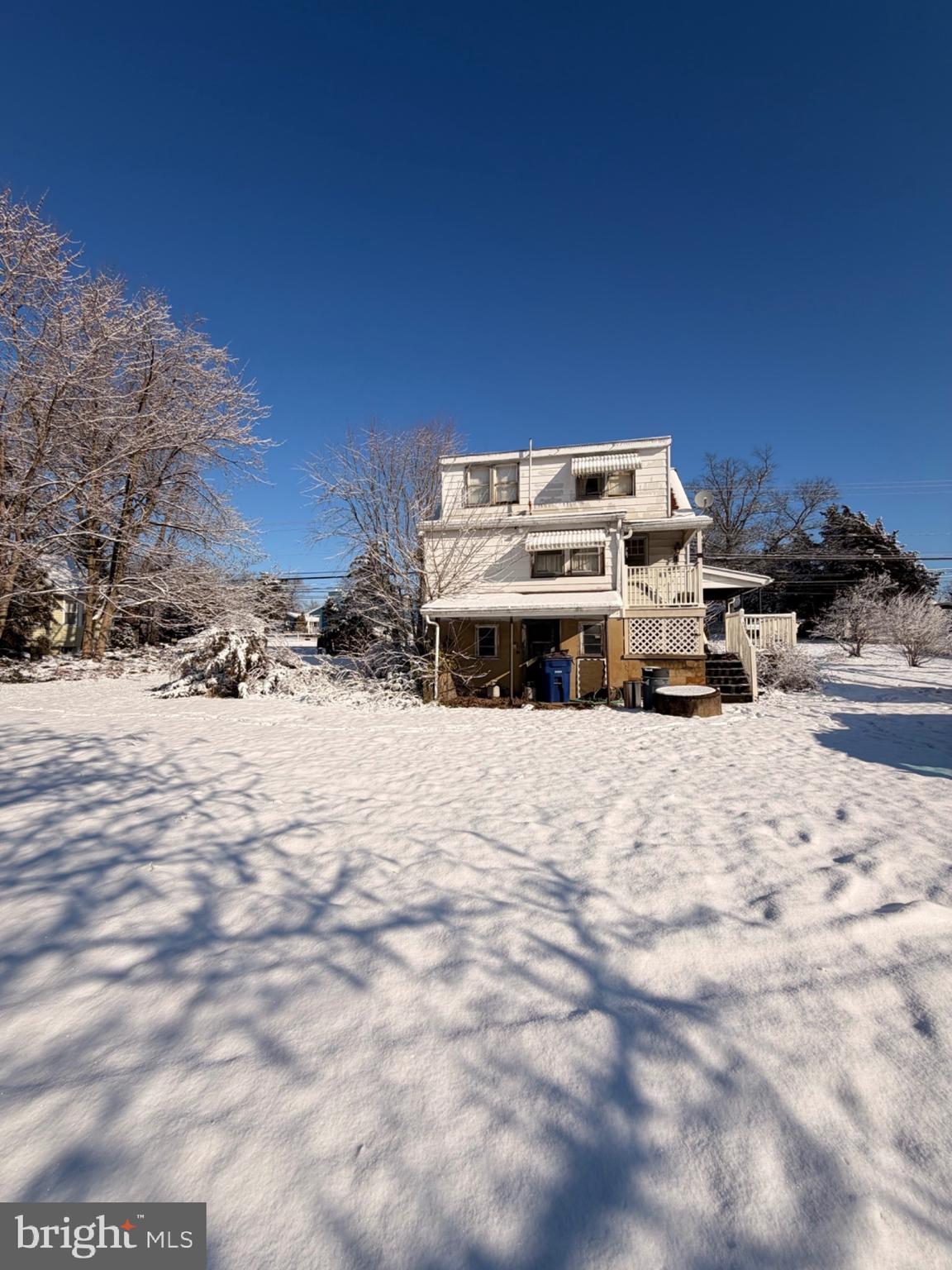 876 Rancocas Road Westampton, NJ 08060 - Photo 4 of 8 a view of a building with snow on the road