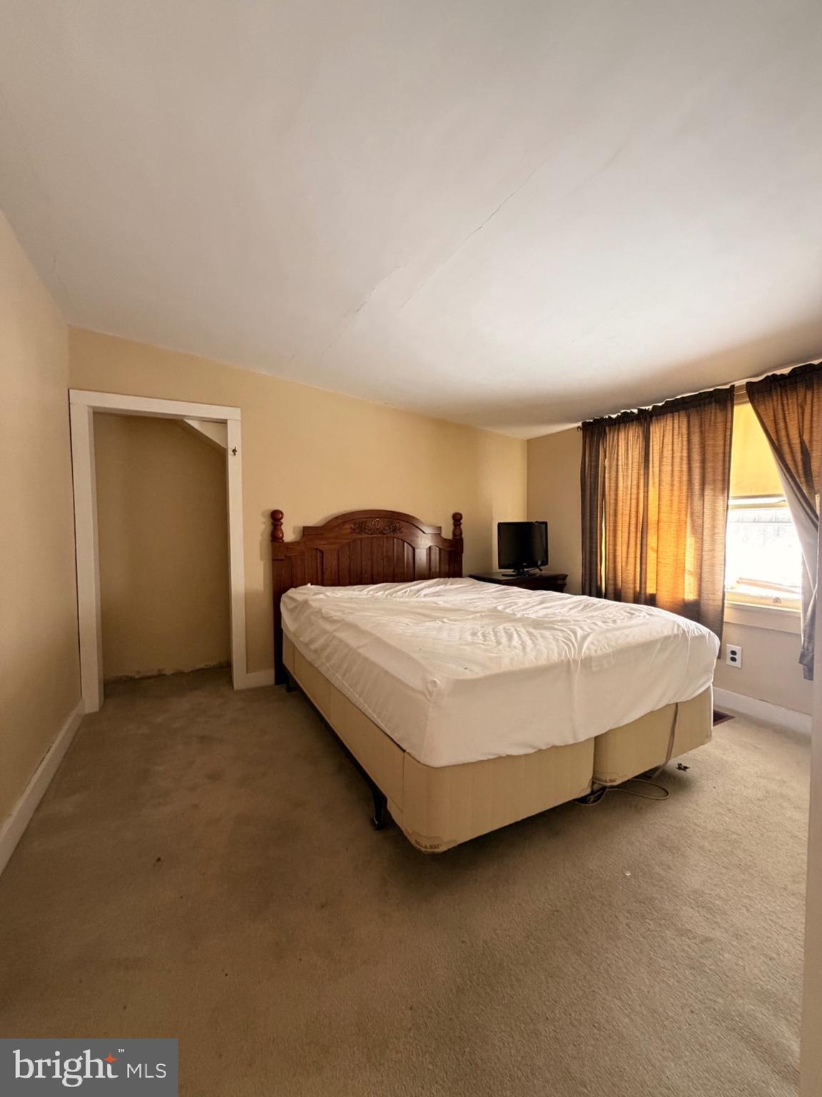 876 Rancocas Road Westampton, NJ 08060 - Photo 6 of 8 a bedroom with a bed and large windows