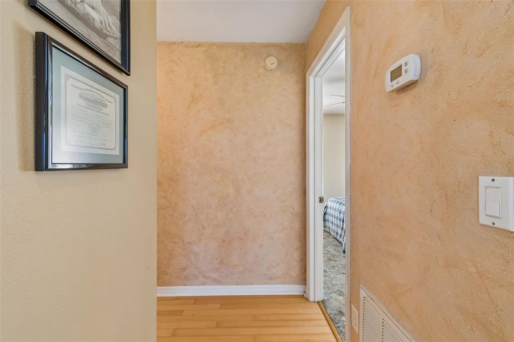 119 Burns Road Terra Ceia, FL 34250 - Photo 50 of 100 a view of a hallway with wooden floor