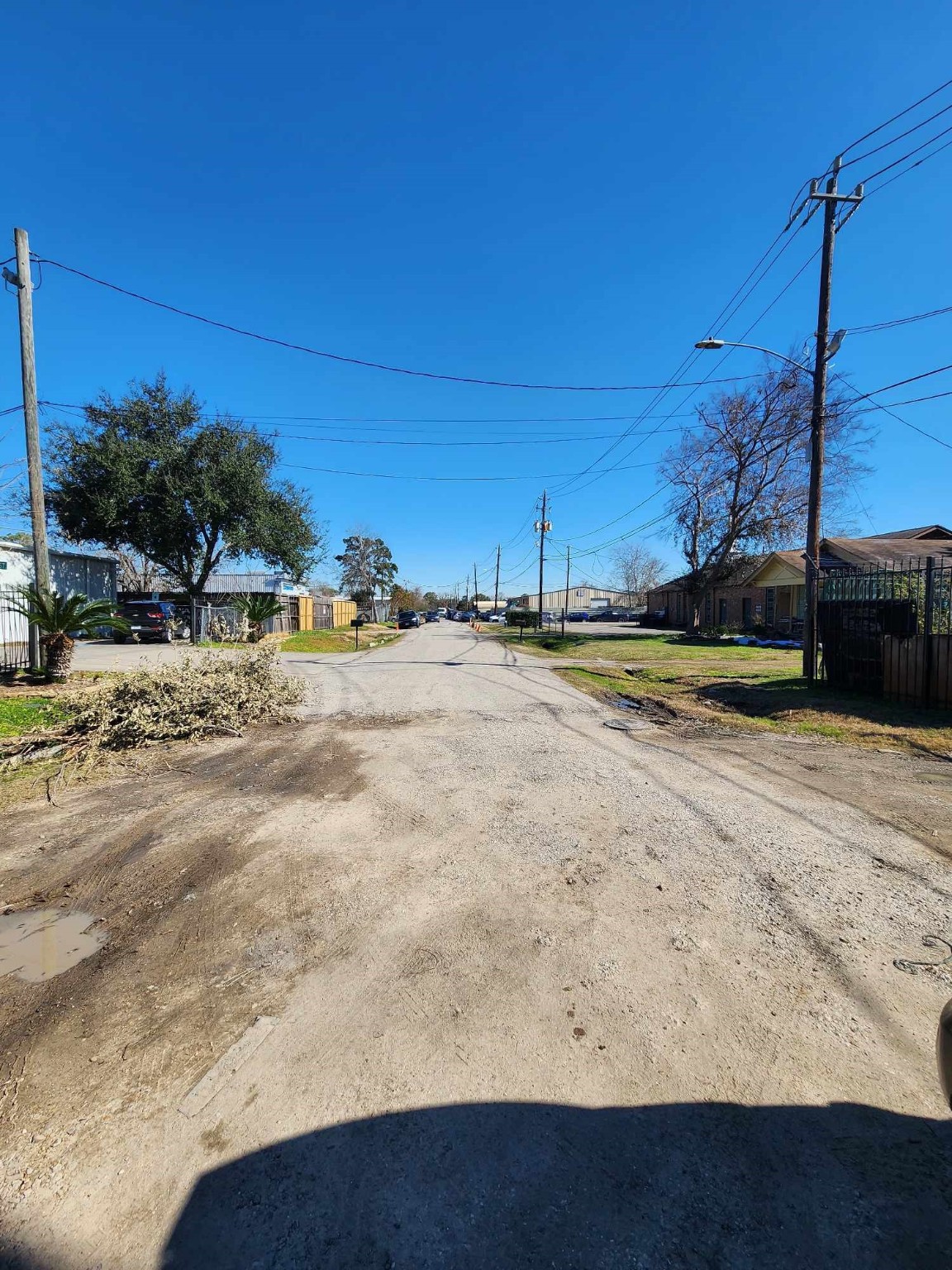 0 Rasmus Drive Houston, TX 77063 - Photo 3 of 11 Charming street view from the gate entrance, offering a welcoming glimpse into the neighborhood.