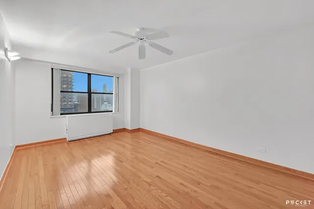 a kitchen with stainless steel appliances granite countertop a refrigerator and a stove