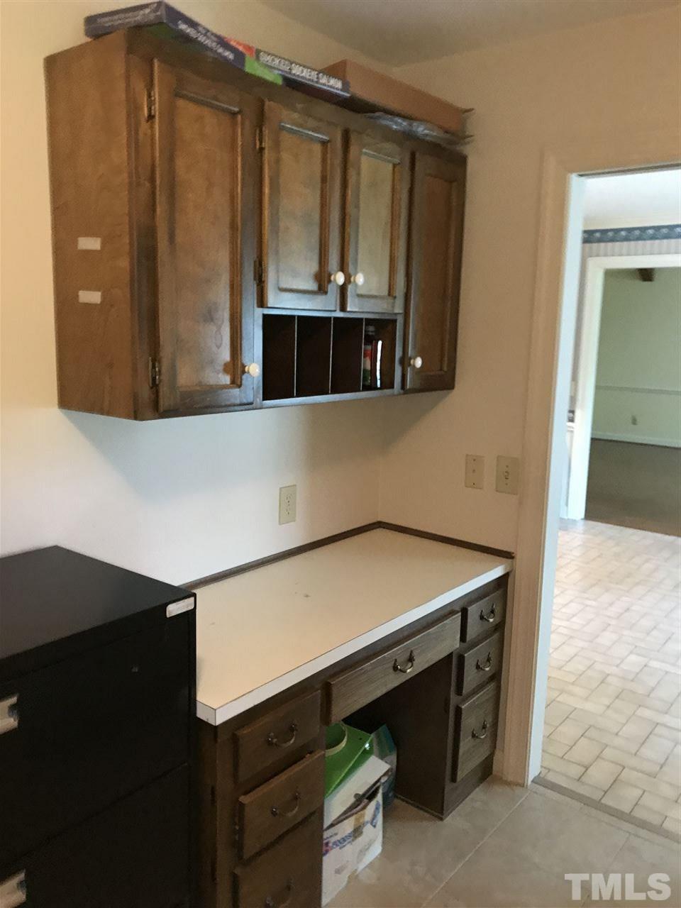 2907 Dunhaven Drive Garner, NC 27529 - Photo 23 of 25 a bathroom with a sink and a mirror