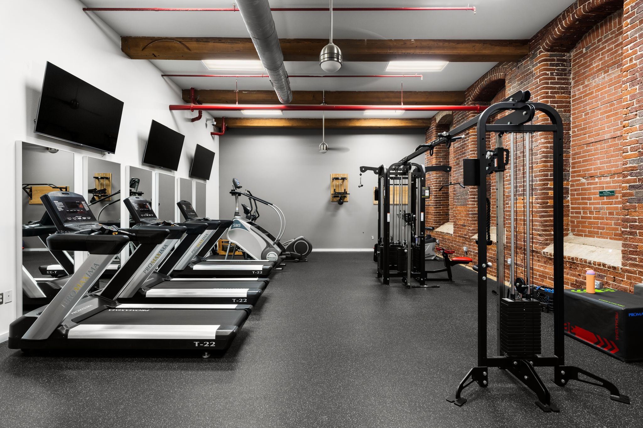 1400 Rosa L Parks Boulevard, Unit 211 Nashville, TN 37208 - Photo 15 of 36 a view of a room with gym equipment