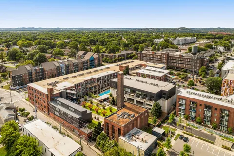 a view of a city with an ocean view