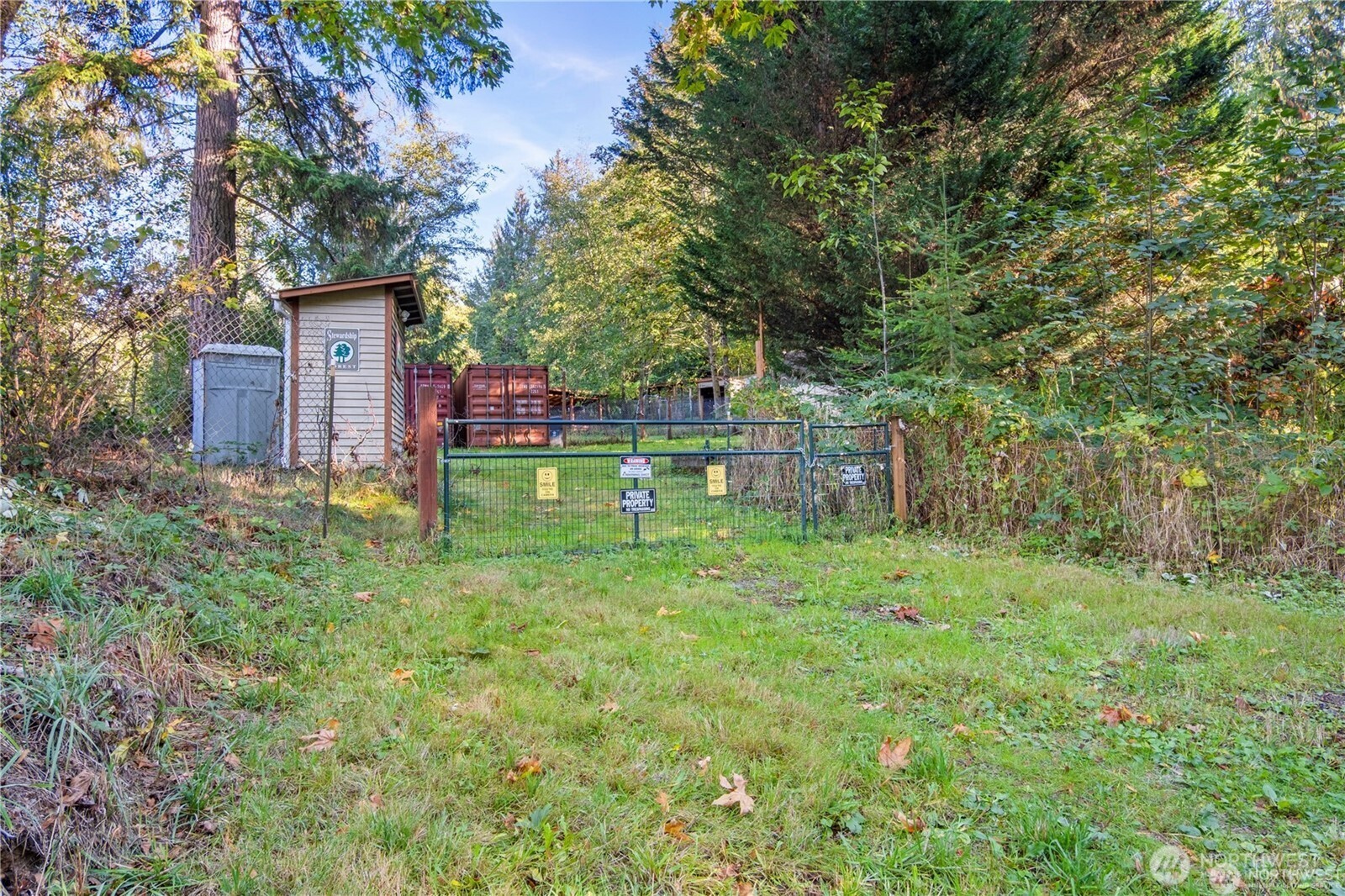 14310 200th Avenue Southeast Renton, WA 98058 - Photo 5 of 39 a backyard of a house with lots of green space