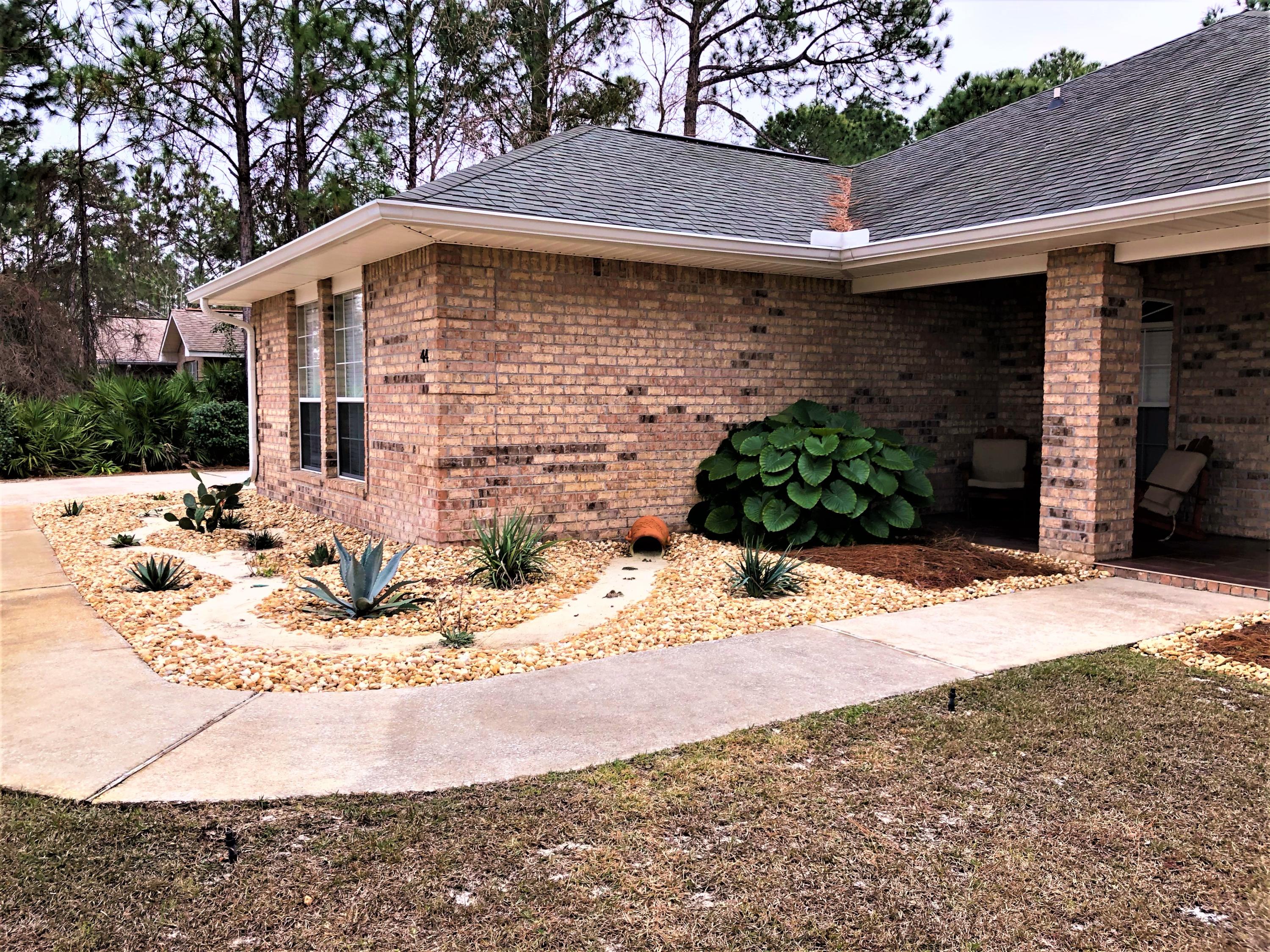 44 East Shipwreck Road Santa Rosa Beach, FL 32459 - Photo 13 of 33 a view of a house with a yard