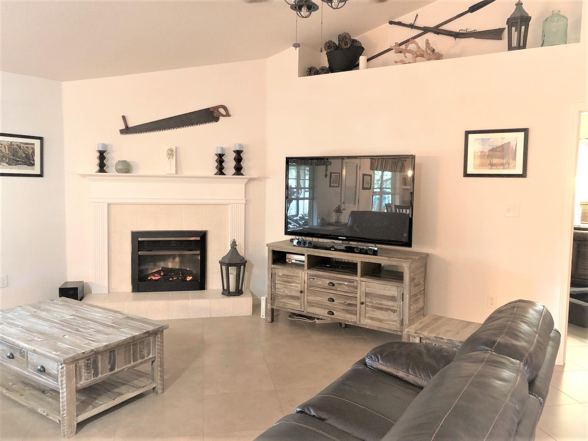 44 East Shipwreck Road Santa Rosa Beach, FL 32459 - Photo 17 of 33 a living room with furniture and a fireplace