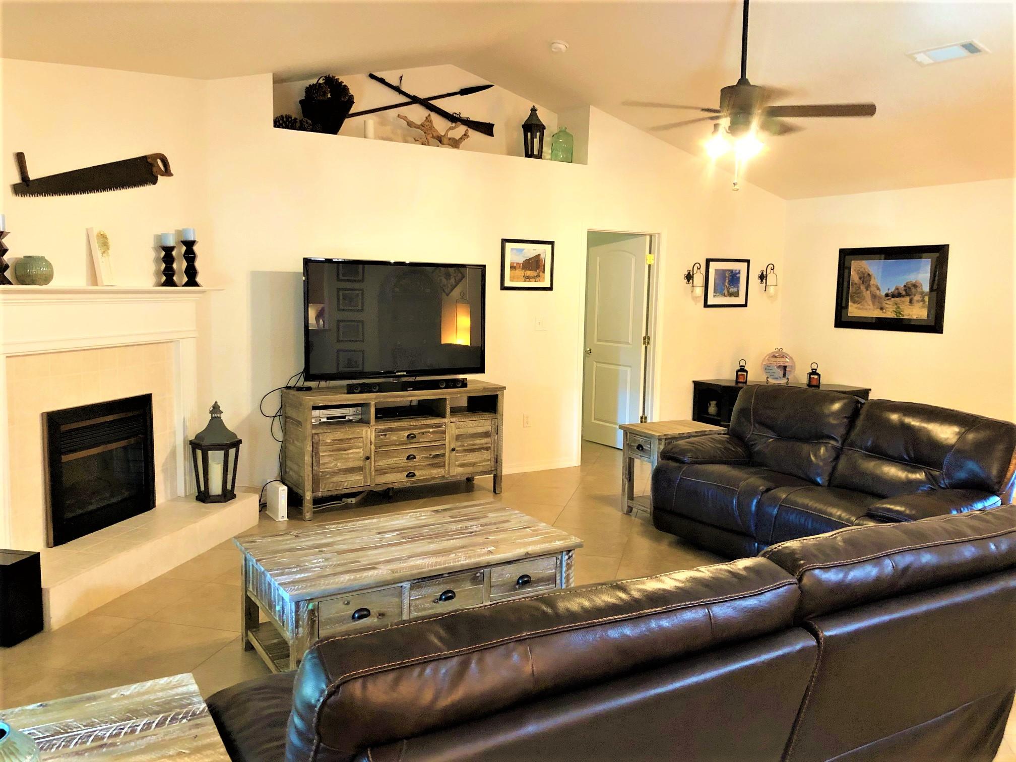 44 East Shipwreck Road Santa Rosa Beach, FL 32459 - Photo 21 of 33 a living room with furniture and a flat screen tv