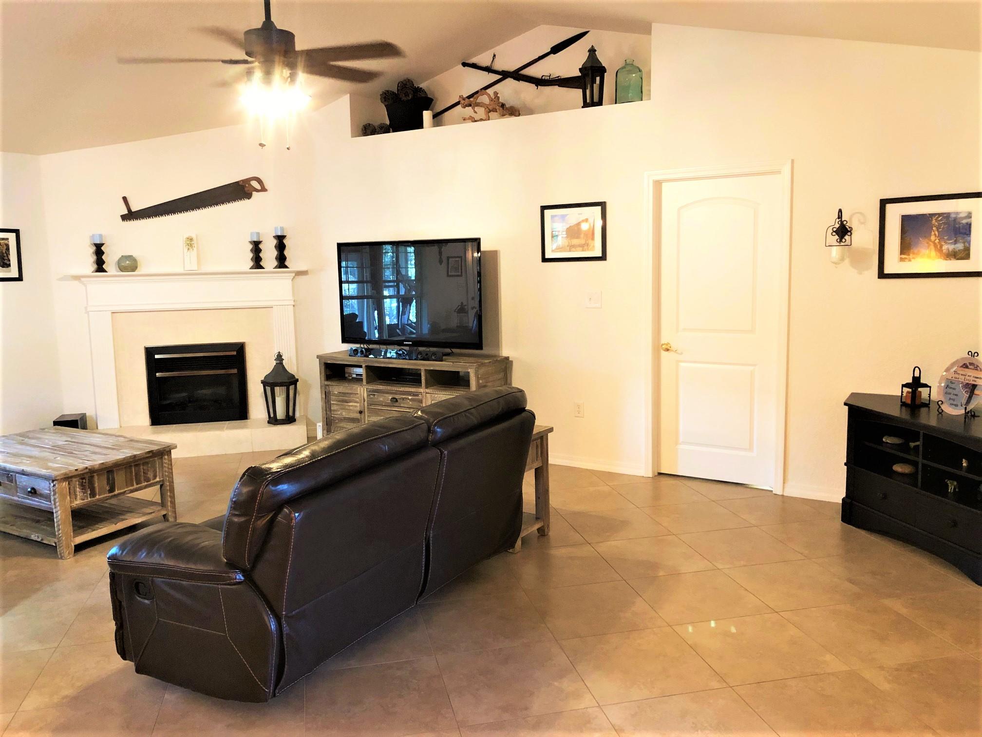 44 East Shipwreck Road Santa Rosa Beach, FL 32459 - Photo 23 of 33 a living room with furniture and a fireplace