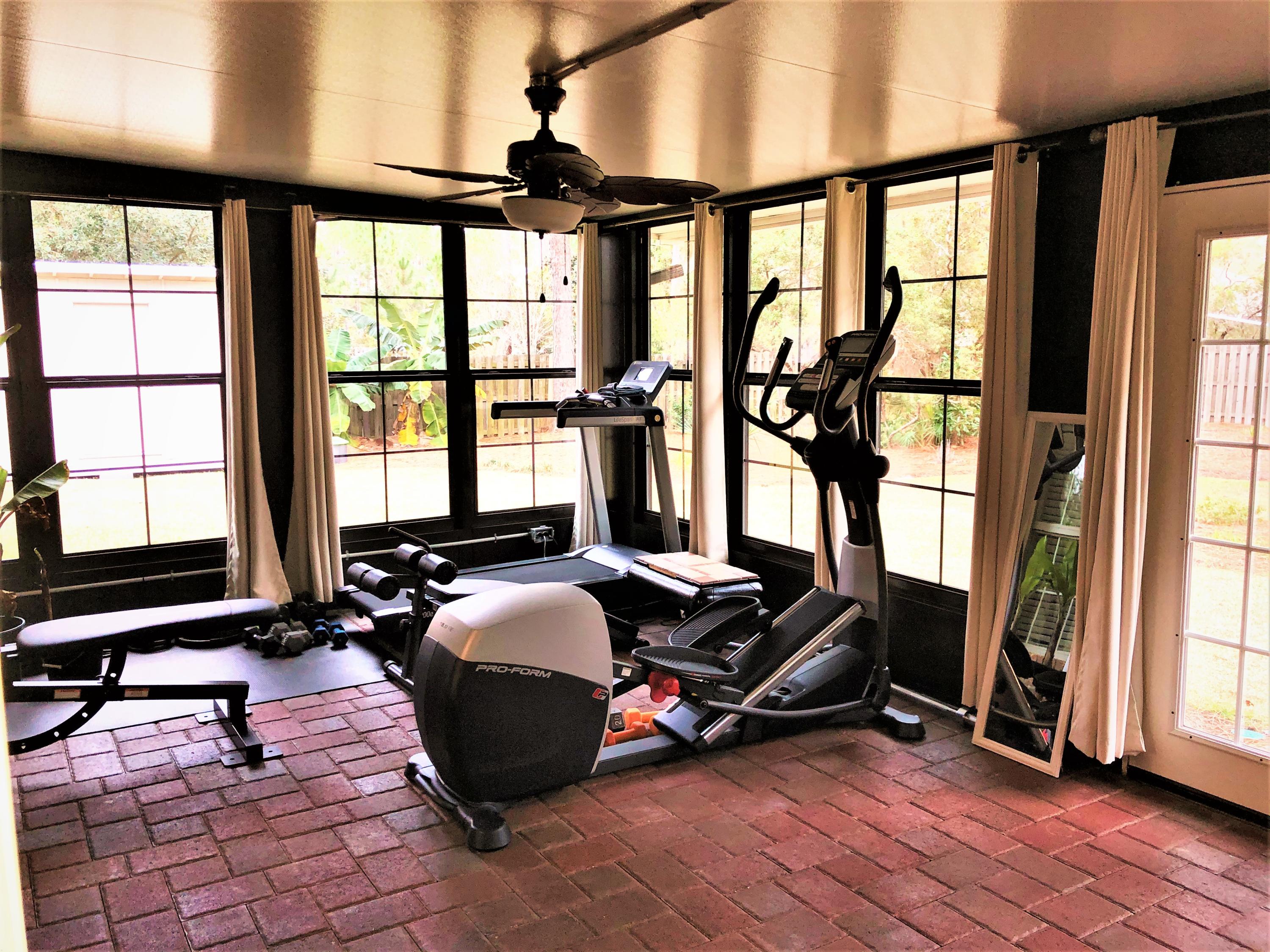 44 East Shipwreck Road Santa Rosa Beach, FL 32459 - Photo 33 of 33 a room with gym equipment and a large window