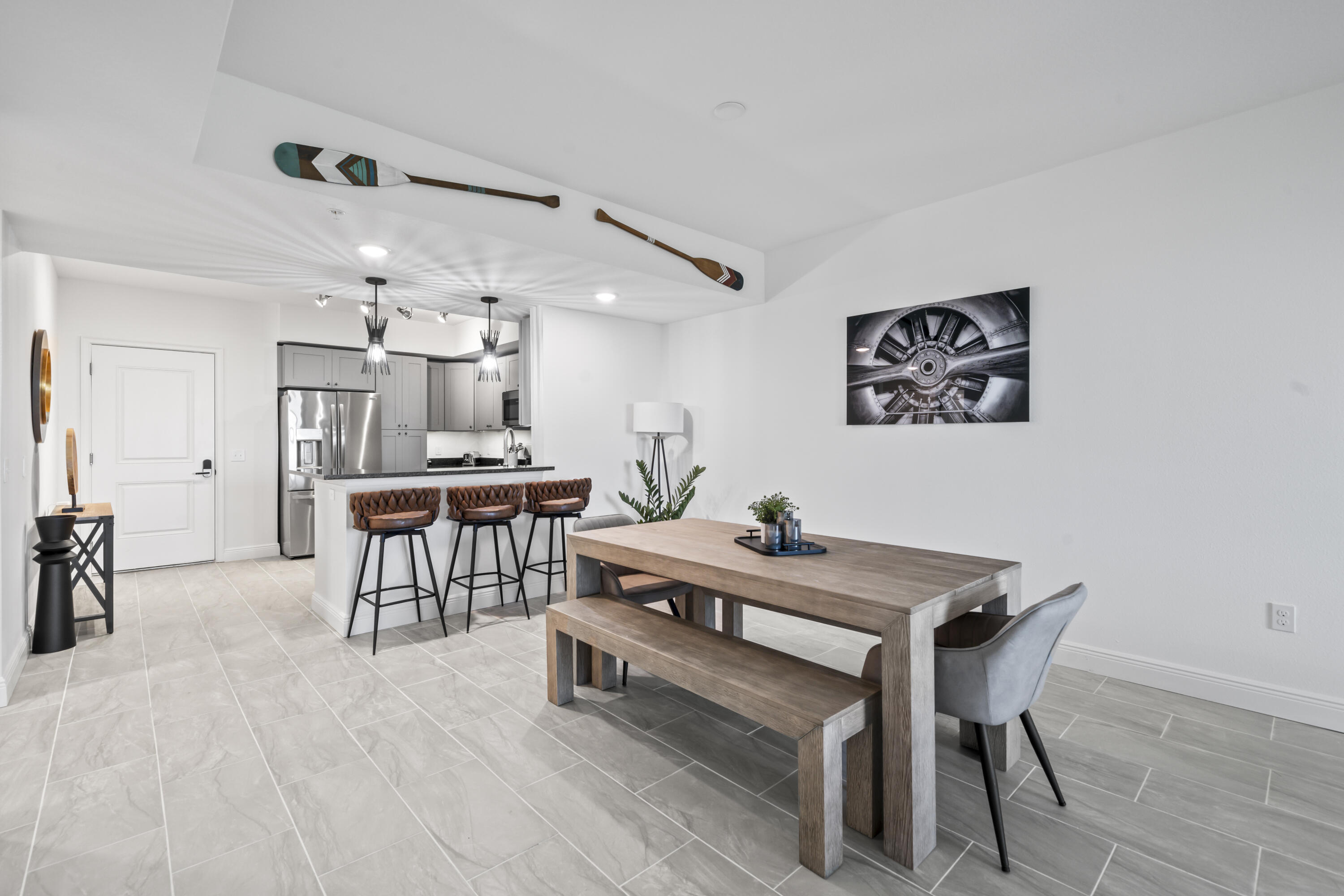 735 Pilot Lane, Unit 1004 Merritt Island, FL 32952 - Photo 12 of 46 a view of a dining room with furniture