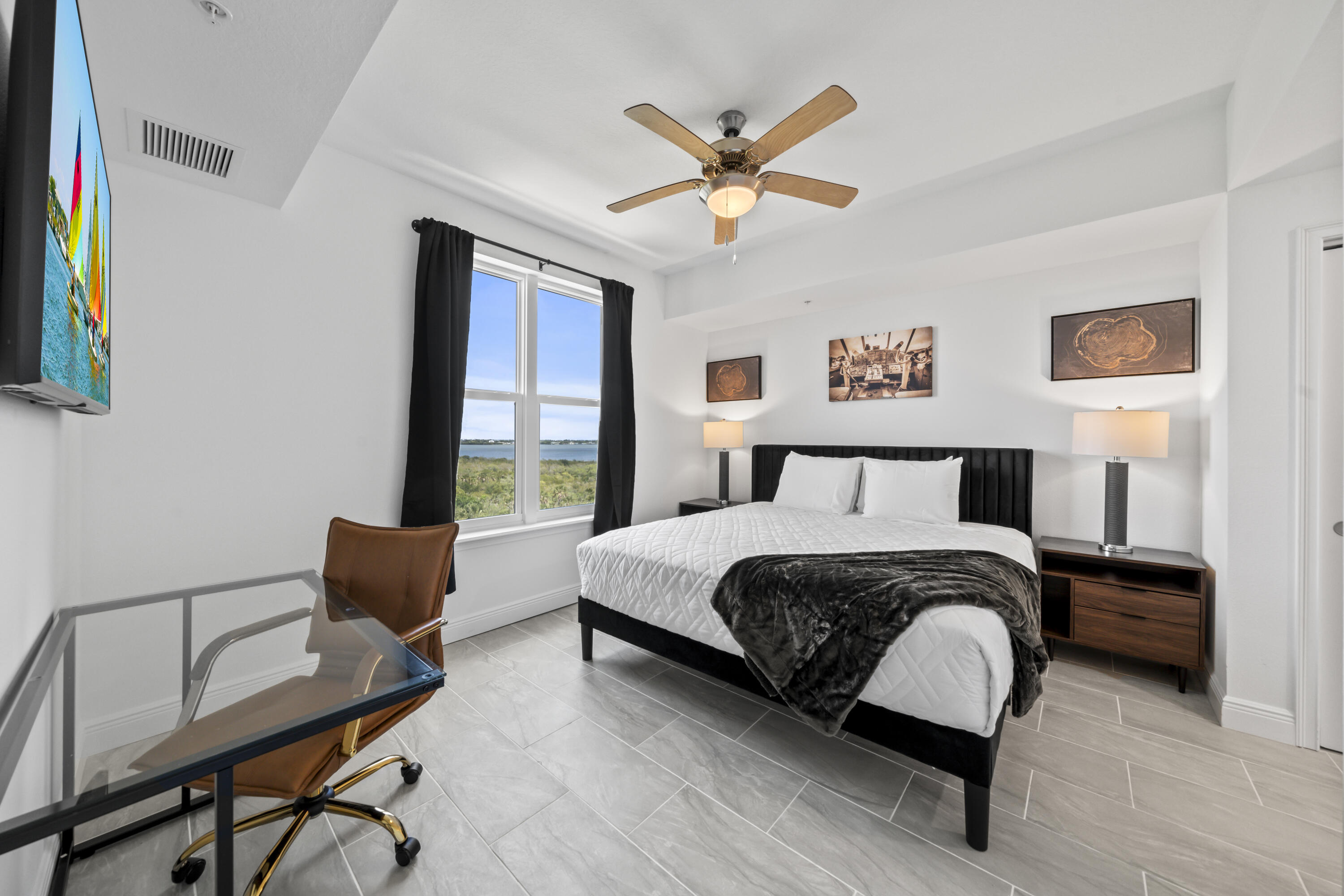 735 Pilot Lane, Unit 1004 Merritt Island, FL 32952 - Photo 17 of 46 a bedroom with a bed and a window